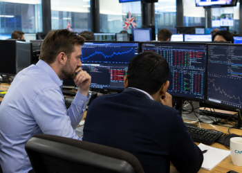 UK stocks edge higher as mining and financial shares lift FTSE 100