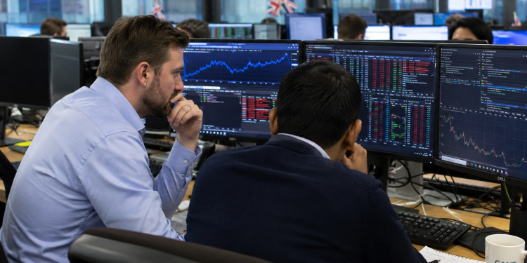 UK stocks edge higher as mining and financial shares lift FTSE 100