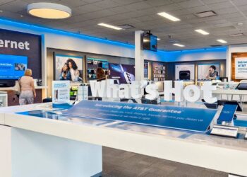 AT&T expands promises to customers as it trails rivals